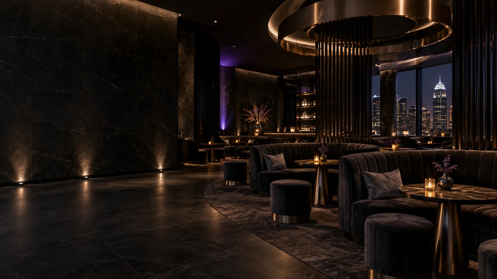 Charcoal velvet lounge seating with candlelight and a metallic overhead ring